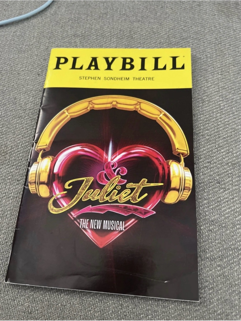 Playbill for & Juliet The Musical at the Stephen Sondheim Theater, New York City